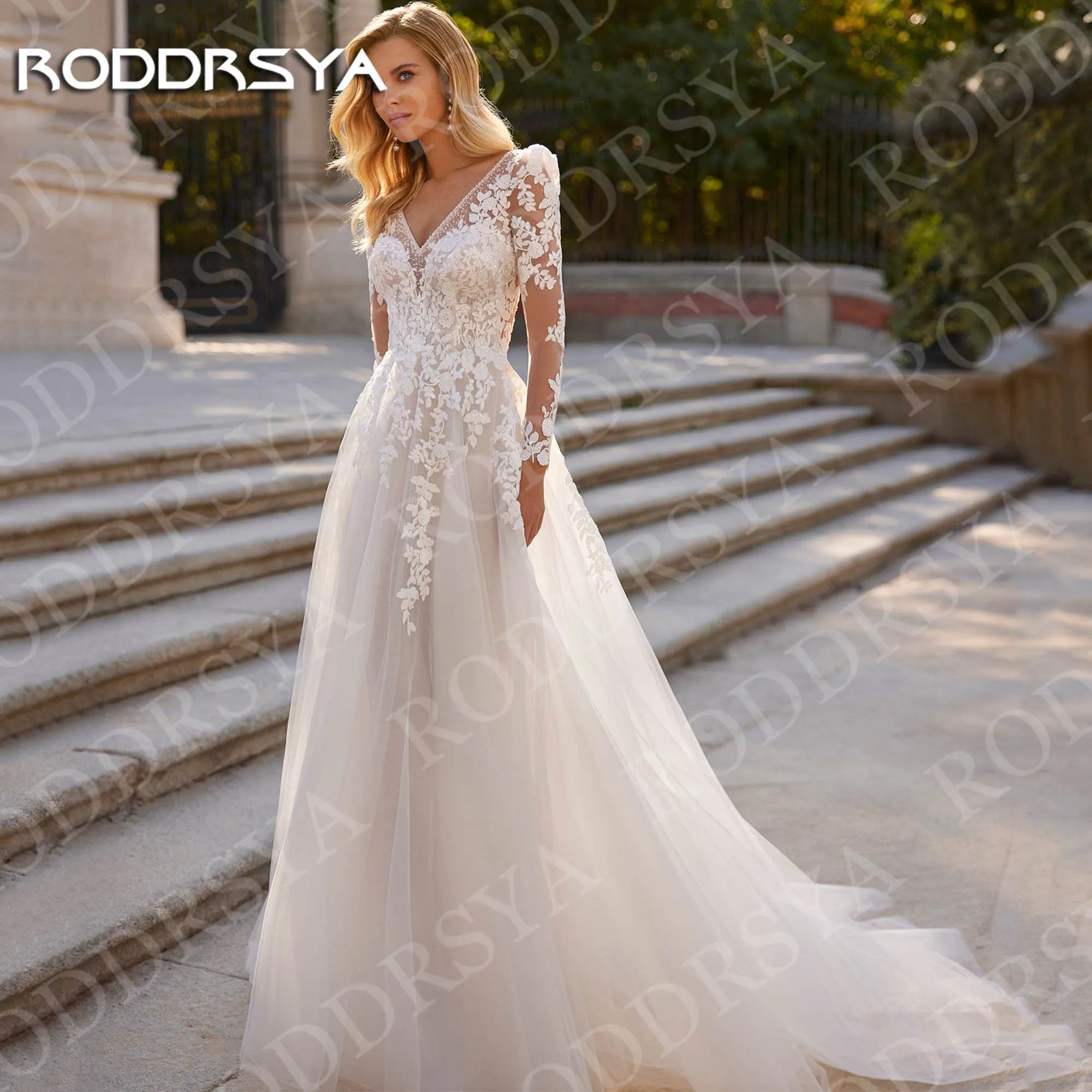 RODDRSYA Elegant Wedding Dress Long Sleeve Backless Lace V Neck Tulle A Line Bridal Dresses Appliques Customized vestido novia
RODDRSYA Elegant Wedding Dress Long Sleeve Backless Lace V Neck Tulle A Line Bridal Dresses Appliques Customized vestido novia