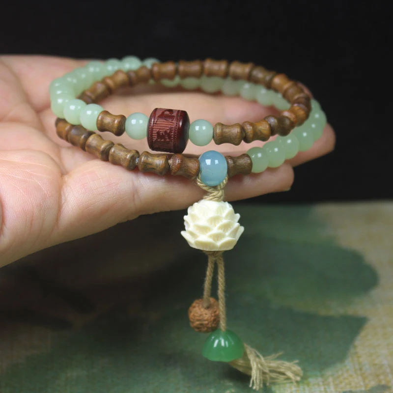 Sandalwood Bamboo Joint Light Green Double Circle Buddhist Bead Bracelet with White Lotus Design, Simple Forest Style
Sandalwood Bamboo Joint Light Green Double Circle Buddhist Bead Bracelet with White Lotus Design, Simple Forest Style