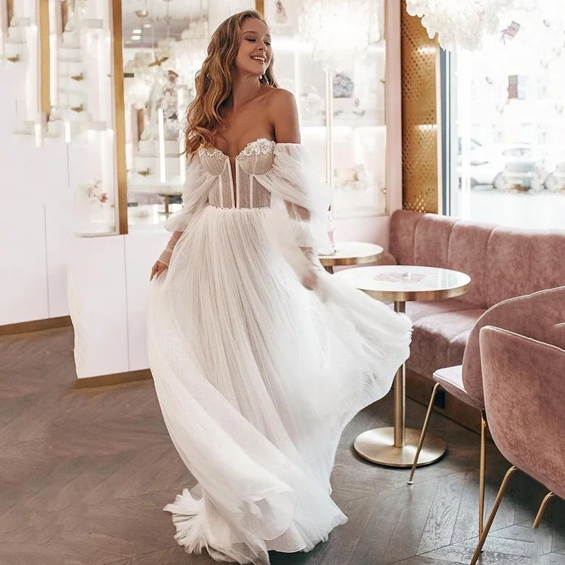 Sexy Vintage Beads A Line Beach Wedding Gowns Off the Shoulder Long Puff Sleeve Wedding Dress vestido de noiva Bridal Dresses
Sexy Vintage Beads A Line Beach Wedding Gowns Off the Shoulder Long Puff Sleeve Wedding Dress vestido de noiva Bridal Dresses
