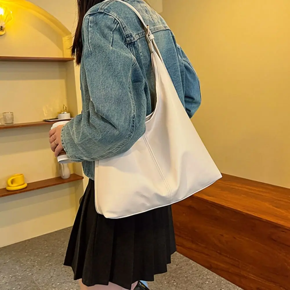 Корейский стиль, дорожная сумка на плечо, однотонная большая вместительная сумка из искусственной кожи, дизайн меньшинства, женская сумка под мышками в стиле ретро 
Корейский стиль, дорожная сумка на плечо, однотонная большая вместительная сумка из искусственной кожи, дизайн меньшинства, женская сумка под мышками в стиле ретро