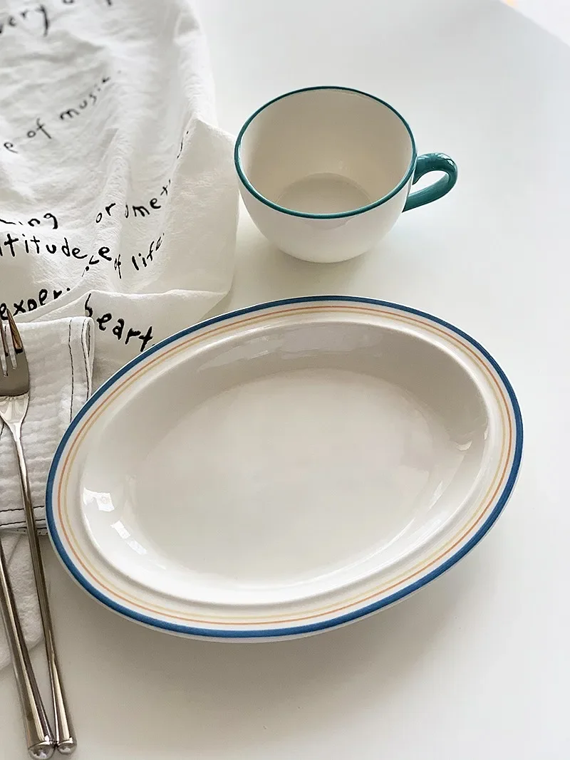 Anmuli Ceramic Dining Plate Restaurant Style Home Use Oval Shape Stripe Pattern Korean Version Glazed above Color Process
Anmuli Ceramic Dining Plate Restaurant Style Home Use Oval Shape Stripe Pattern Korean Version Glazed above Color Process