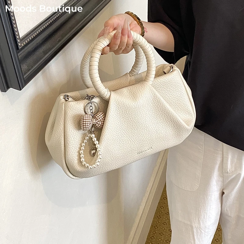 Pleated Design Round Top-handle Bags For Women Pure Color PU Leather Shoulder Crossbody Bag With Pendant Luxury Designer Handbag
Pleated Design Round Top-handle Bags For Women Pure Color PU Leather Shoulder Crossbody Bag With Pendant Luxury Designer Handbag