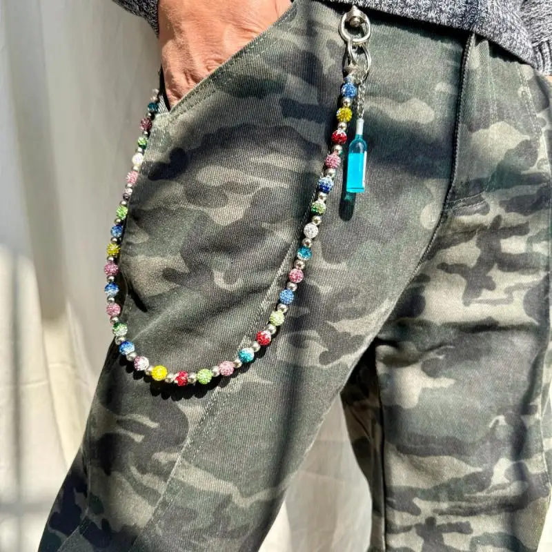 Handmade punk style pants with shiny colored bead design and fashionable denim accents for both men and women
Handmade punk style pants with shiny colored bead design and fashionable denim accents for both men and women