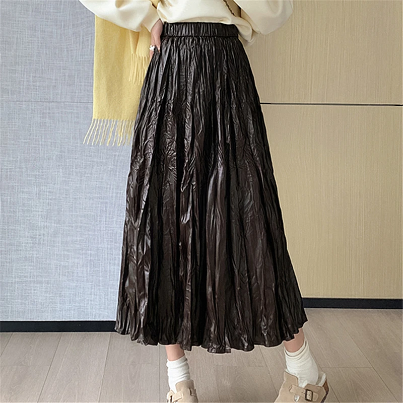 Seoulish 2024 Autumn Winter New Women's PU Long Skirts Fashion Korean Style Solid Color Loose High Waist A-line Pleated Skirts
Seoulish 2024 Autumn Winter New Women's PU Long Skirts Fashion Korean Style Solid Color Loose High Waist A-line Pleated Skirts