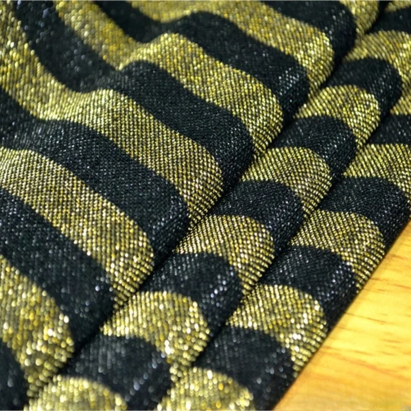 Fashionable gold and black interlaced bright silk knitted elastic horizontal striped fashion fabric top dress
Fashionable gold and black interlaced bright silk knitted elastic horizontal striped fashion fabric top dress
