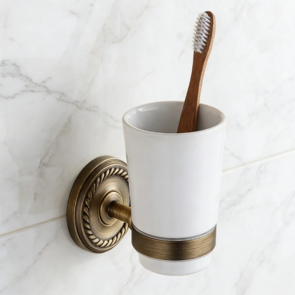 Wall-mounted antique brass tooth cup holder, special rack for bathroom washstand
Wall-mounted antique brass tooth cup holder, special rack for bathroom washstand