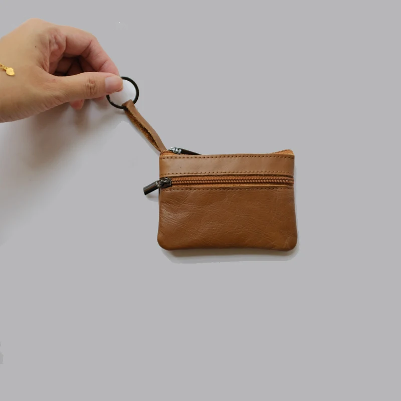 Genuine Leather Coin Purse for Men Women Mini Zipper Wallet Vintage Small Money Wallets Key Pouch Small Card Holder
Genuine Leather Coin Purse for Men Women Mini Zipper Wallet Vintage Small Money Wallets Key Pouch Small Card Holder
