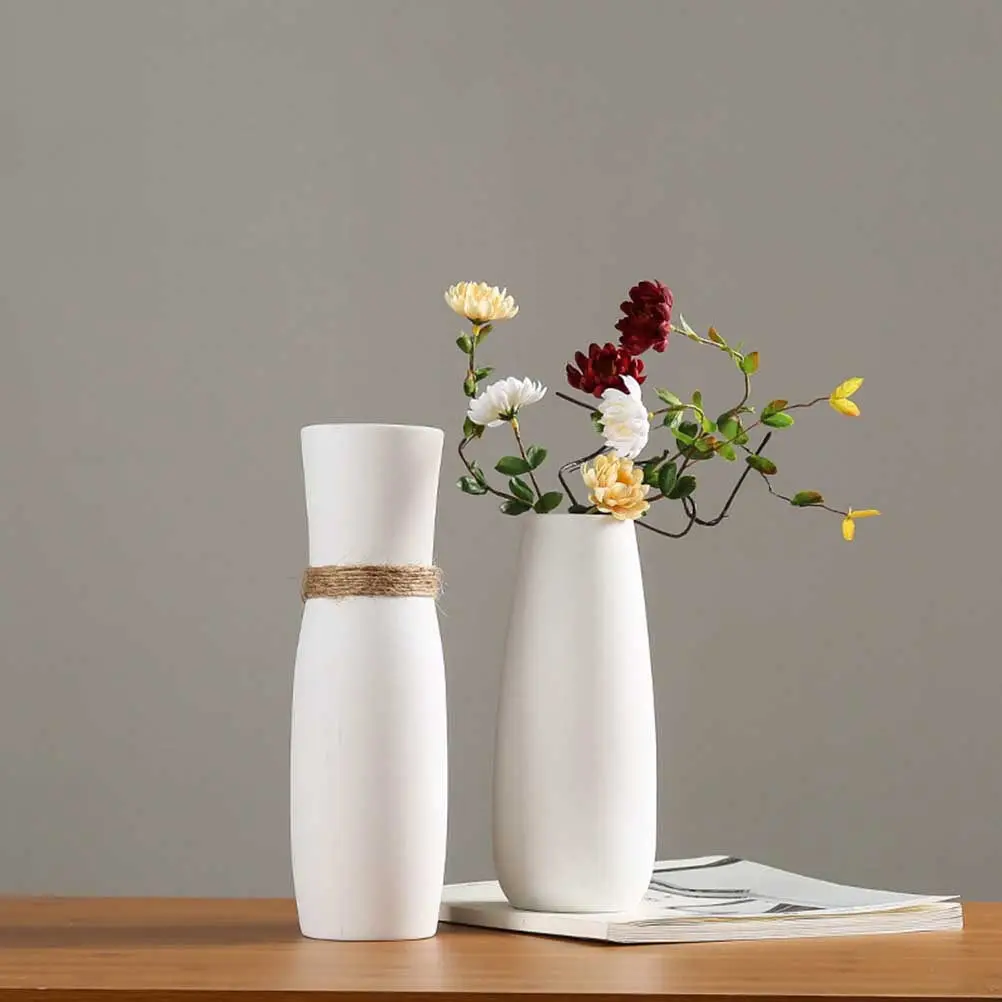 Modern White Ceramic Flower Vase Artistic Home Decor Piece for Dried Flowers Indoor Living Room Bedroom Stylish Minimalist Vase
Modern White Ceramic Flower Vase Artistic Home Decor Piece for Dried Flowers Indoor Living Room Bedroom Stylish Minimalist Vase