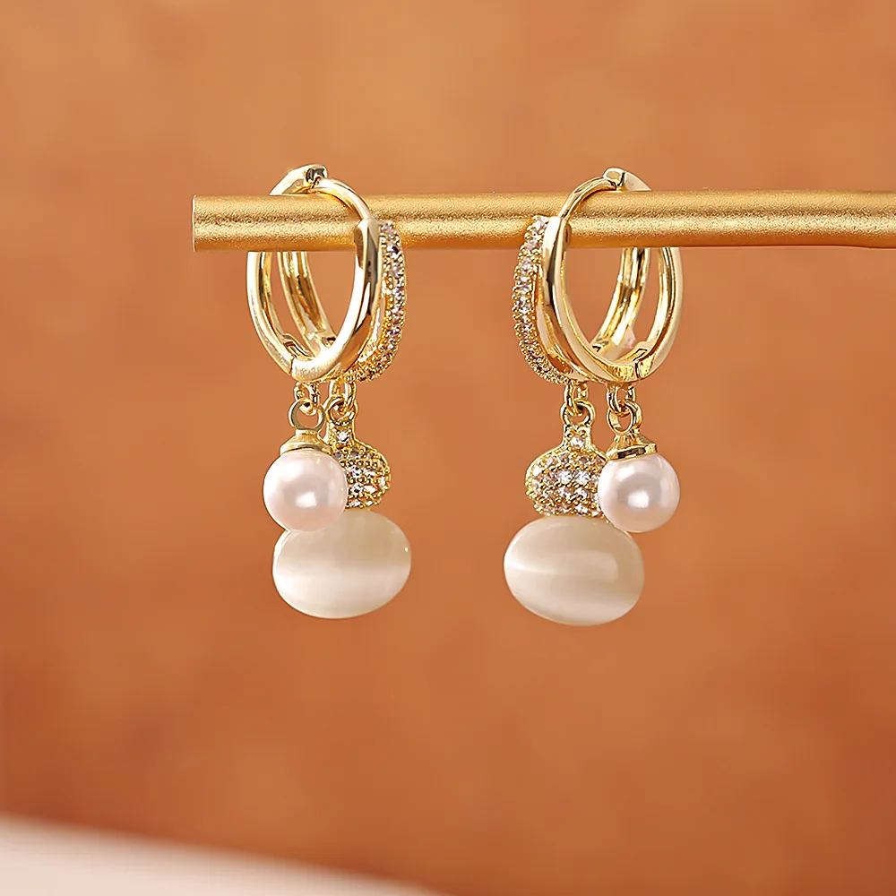 Fashionable zircon cat's eye gourd earrings, light luxury, high-end, elegant pearl earrings, versatile commuting earrings
Fashionable zircon cat's eye gourd earrings, light luxury, high-end, elegant pearl earrings, versatile commuting earrings