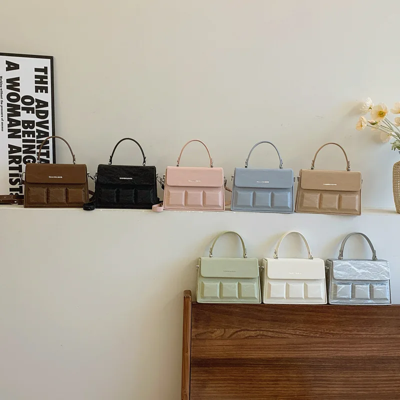 New High-end Indentation Handbag, Simple and Trendy Versatile Oblique Span Bag, Niche Design Box Bag Woman
New High-end Indentation Handbag, Simple and Trendy Versatile Oblique Span Bag, Niche Design Box Bag Woman