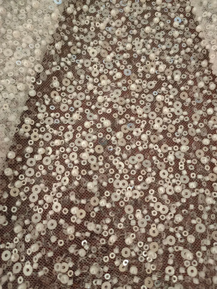 White Beaded Pearl Sequined Soft Lace Fabric for Women's Wedding Dresses Netting Lace DIY Customized Clothing Accessories Ideal
White Beaded Pearl Sequined Soft Lace Fabric for Women's Wedding Dresses Netting Lace DIY Customized Clothing Accessories Ideal