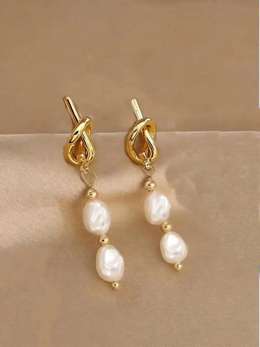 Asymmetrical Knotted Metal And Pearl Drop Earrings For Women
Asymmetrical Knotted Metal And Pearl Drop Earrings For Women