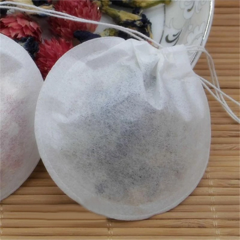 100Pcs Disposable Tea Bag Drawstring Empty Pouch for Loose Leaf Powder Herbs Spice Filter Paper 75mm White Tea Bag
100Pcs Disposable Tea Bag Drawstring Empty Pouch for Loose Leaf Powder Herbs Spice Filter Paper 75mm White Tea Bag