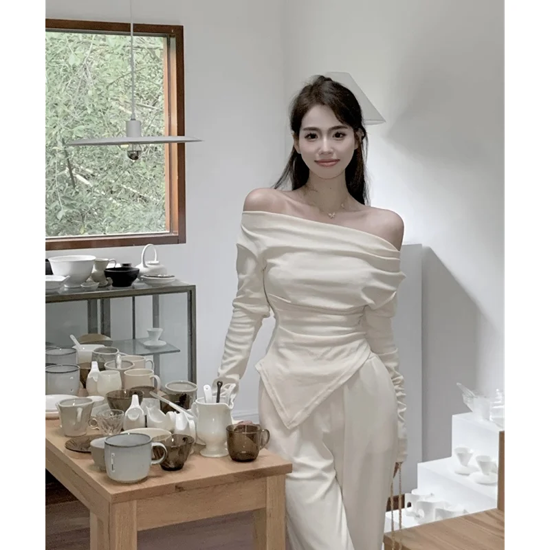 Women's Clothing Slim Fit Irregular Long Sleeves Off The Shoulder T-shirt Design Chic Korean Version High Waist Casual Pants Set
Women's Clothing Slim Fit Irregular Long Sleeves Off The Shoulder T-shirt Design Chic Korean Version High Waist Casual Pants Set