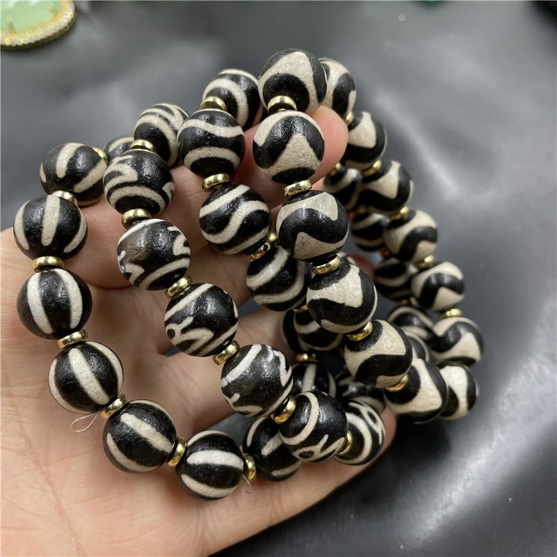 14mm Pumpkin Agate Bead Bracelet with Tiger Tooth Abacus Beads and Ripple Pattern
14mm Pumpkin Agate Bead Bracelet with Tiger Tooth Abacus Beads and Ripple Pattern