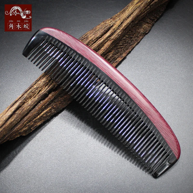 Comb made of hornwood and purple heart wood with buffalo horn, for massage and hair styling
Comb made of hornwood and purple heart wood with buffalo horn, for massage and hair styling