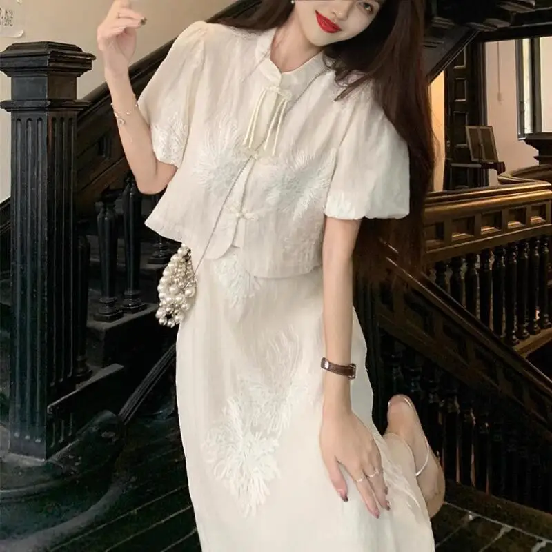 Hot 2026 Summer New Women Clothing New Chinese Style Tassel Short Sleeve Shirt High Waist Half Body Long Dress Fashion Luxuryset
Hot 2026 Summer New Women Clothing New Chinese Style Tassel Short Sleeve Shirt High Waist Half Body Long Dress Fashion Luxuryset