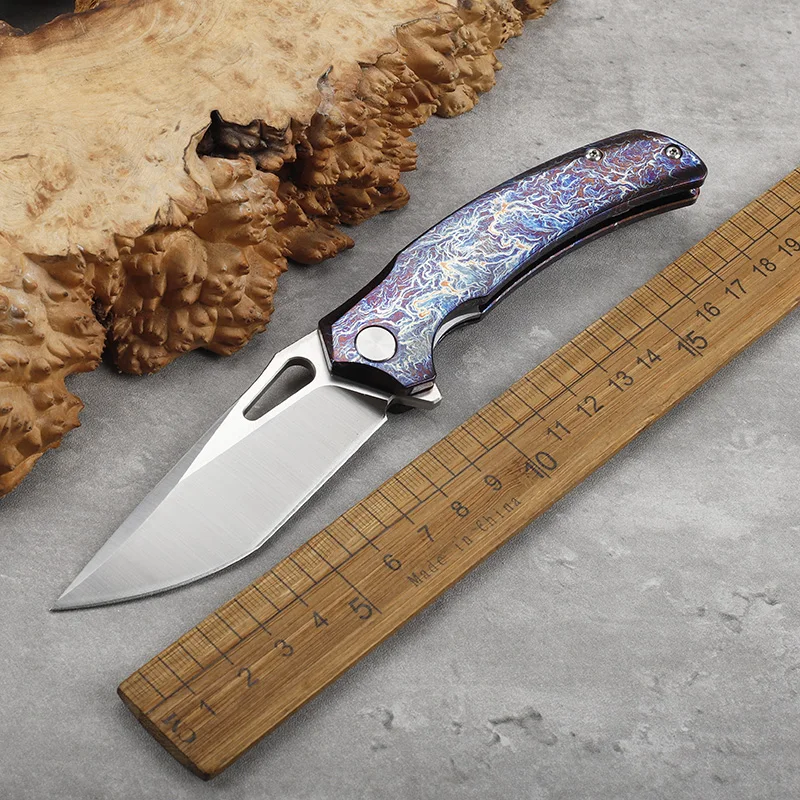 M390 steel colored titanium alloy handle folding knife, outdoor self-defense survival camping hiking portable tool knife
M390 steel colored titanium alloy handle folding knife, outdoor self-defense survival camping hiking portable tool knife