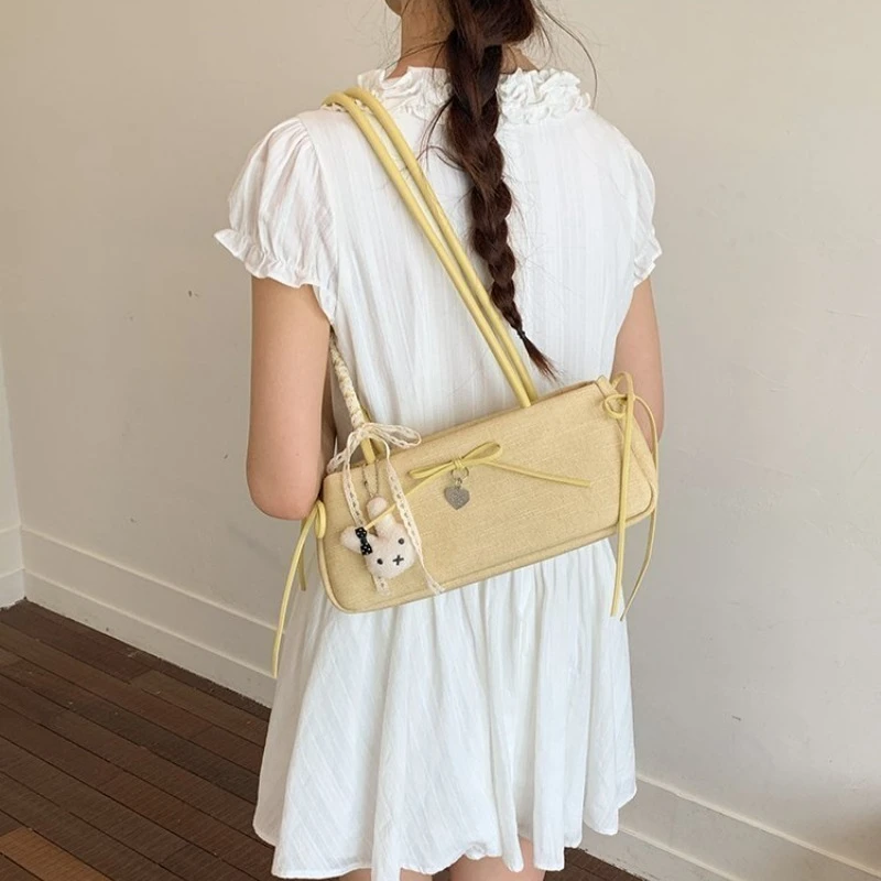 Women's Fabric Shoulder Bag with Lace Bow & Heart Charm, Long Handle, Casual Style for Daily Errands & Weekend Outings
Women's Fabric Shoulder Bag with Lace Bow & Heart Charm, Long Handle, Casual Style for Daily Errands & Weekend Outings