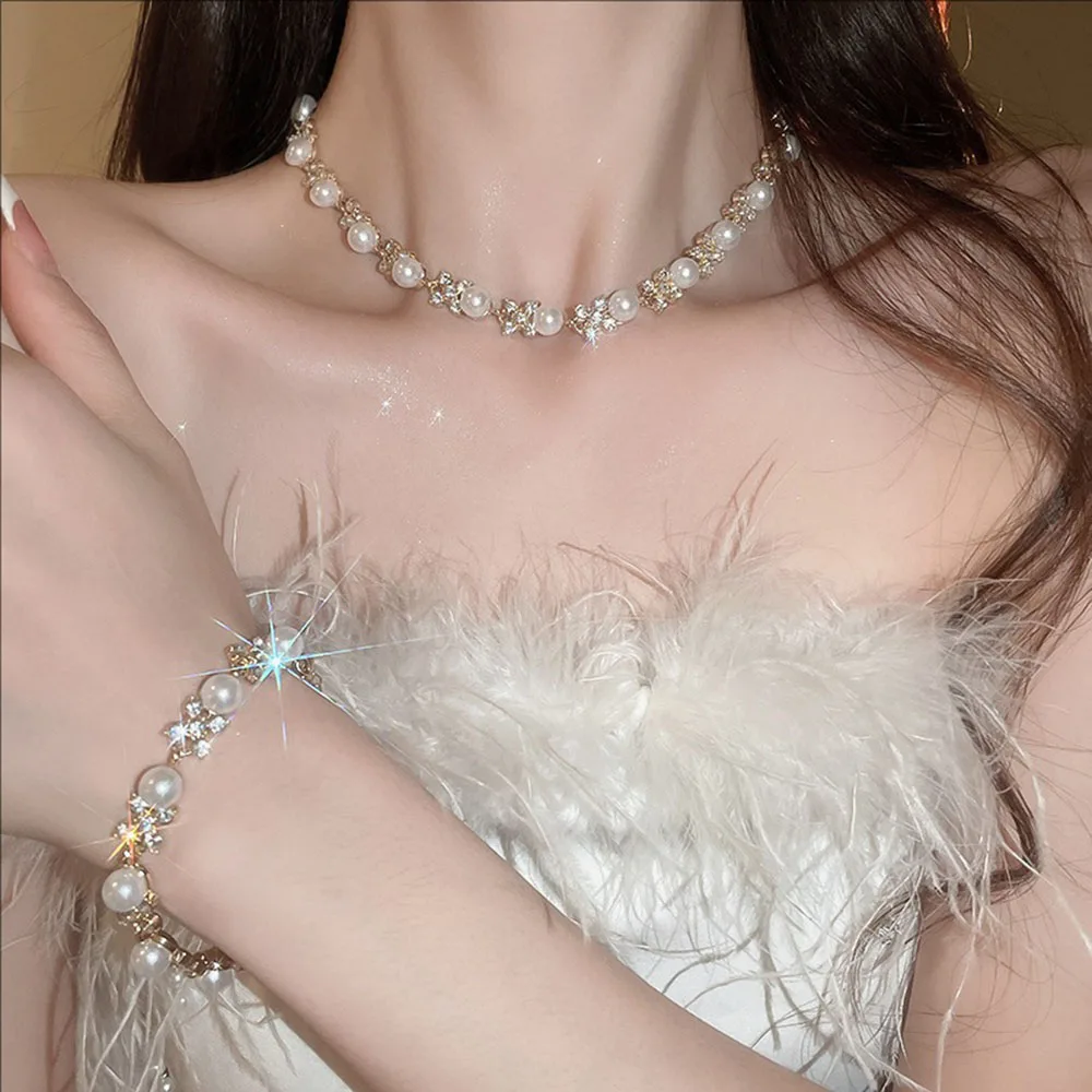 Crystal-encrusted Flower Round Pearl Earrings Bracelet Necklace Set French Collarbone Chain Fashionable High-end Jewelry
Crystal-encrusted Flower Round Pearl Earrings Bracelet Necklace Set French Collarbone Chain Fashionable High-end Jewelry