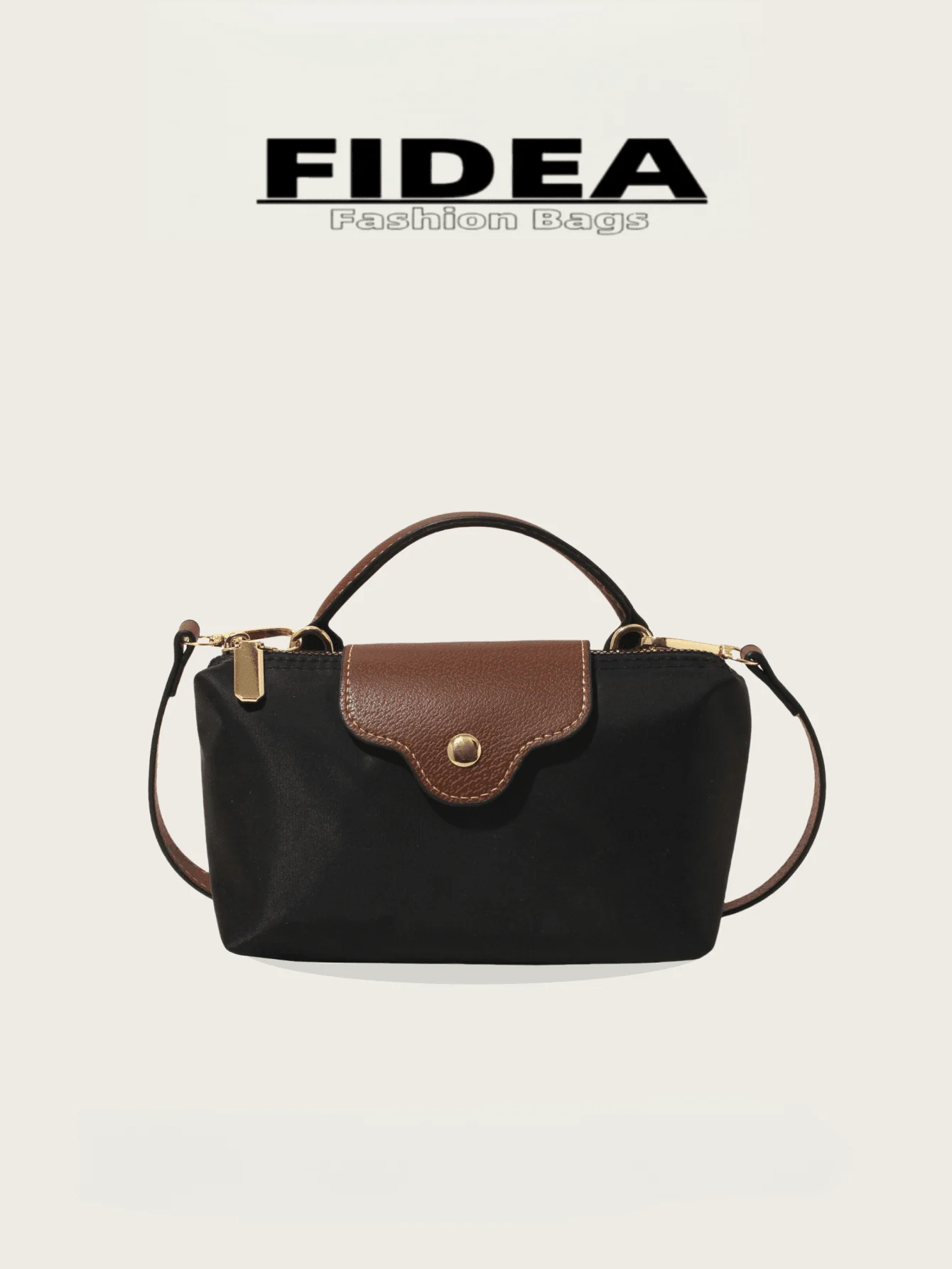 Minimalist Black Nylon Top-Handle Bag with Brown PU Flap and Gold Hardware
Minimalist Black Nylon Top-Handle Bag with Brown PU Flap and Gold Hardware