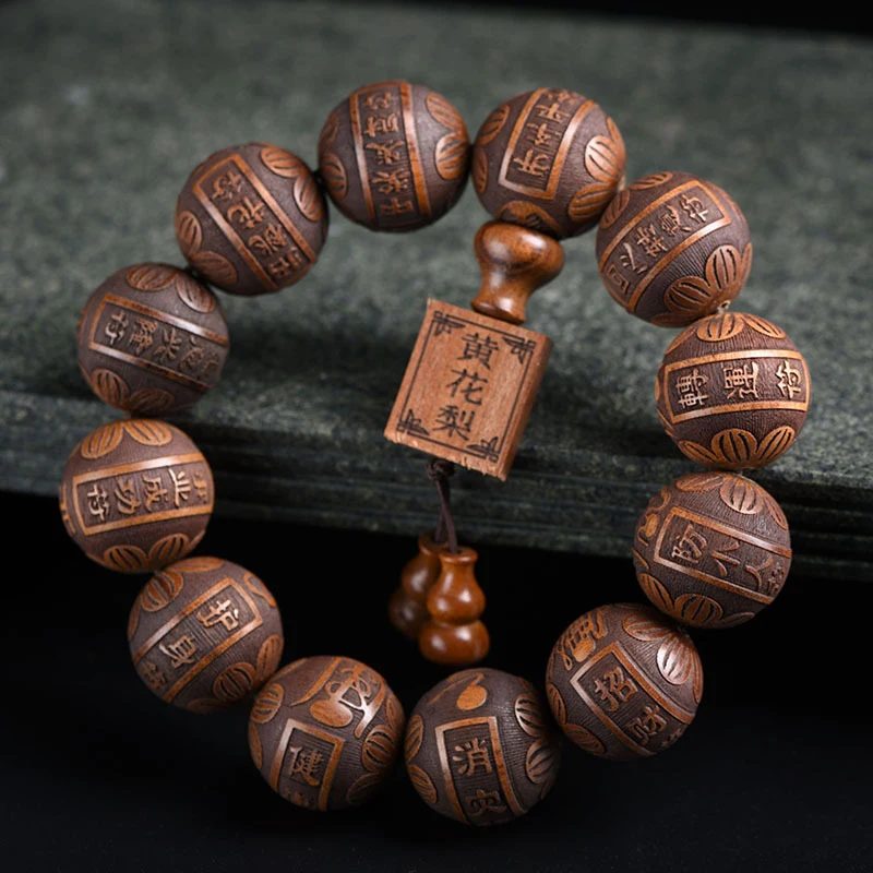 Authentic African Yellow Sandalwood 20mm 12 Exquisitely Carved Beads Ethnic Style Buddhist Bead Bracelet for Men and Women
Authentic African Yellow Sandalwood 20mm 12 Exquisitely Carved Beads Ethnic Style Buddhist Bead Bracelet for Men and Women