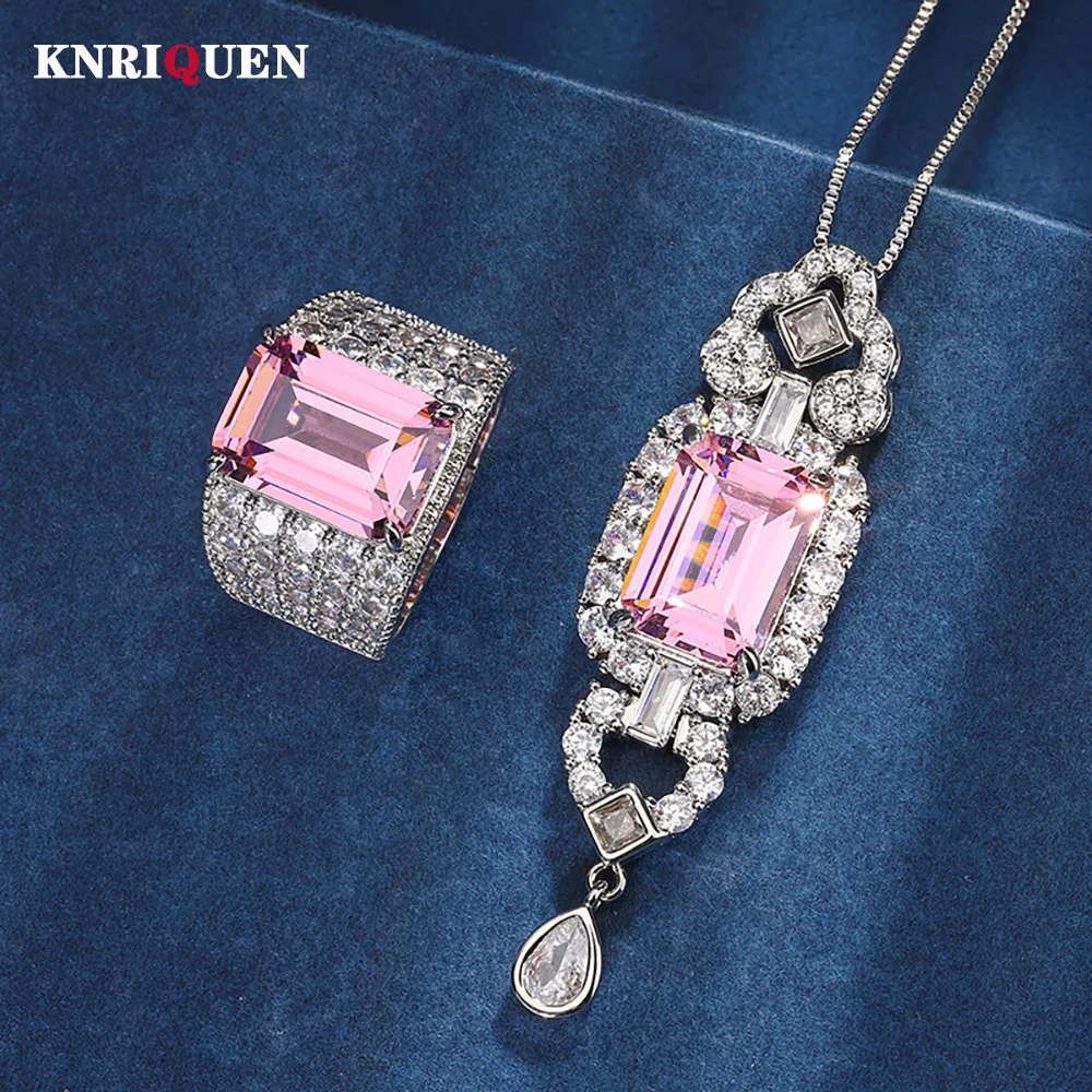 Luxury 10*14MM Pink Quartz High Carbon Diamond Pendant Necklace Rings for Women Wedding Bands Party Fine Jewelry Set Accessories
Luxury 10*14MM Pink Quartz High Carbon Diamond Pendant Necklace Rings for Women Wedding Bands Party Fine Jewelry Set Accessories
