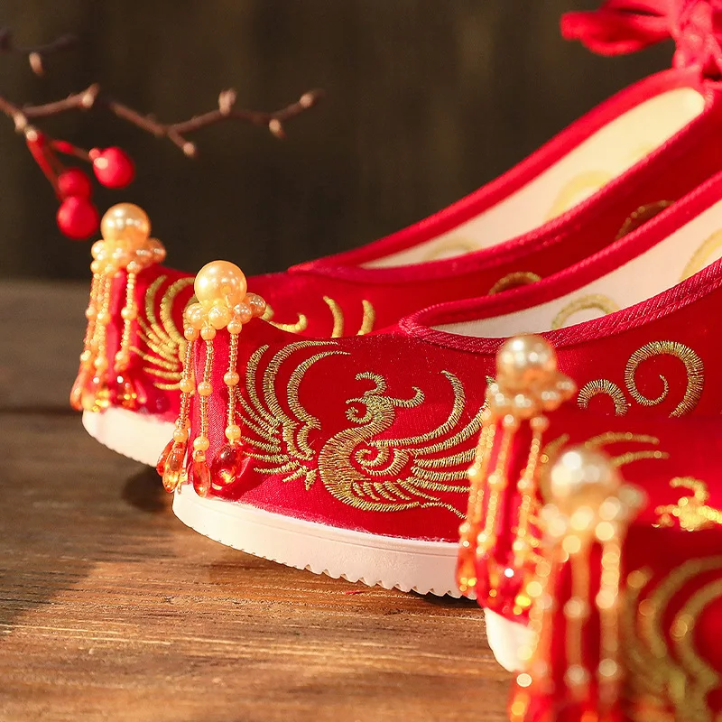 Xiuhe Shoes Women's Spring Height Increasing Pearl Tassel Ancient Style Warped High Heel Chinese Wedding Bridal Embroidery Pumps
Xiuhe Shoes Women's Spring Height Increasing Pearl Tassel Ancient Style Warped High Heel Chinese Wedding Bridal Embroidery Pumps