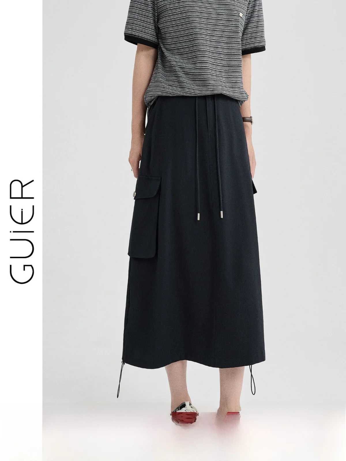 Юбка А-силуэта с высокой талией женская повседневная универсальная летняя новая модель стройнящая ретро-юбка от Guier на шнурке свободного кроя
Юбка А-силуэта с высокой талией женская повседневная универсальная летняя новая модель стройнящая ретро-юбка от Guier на шнурке свободного кроя