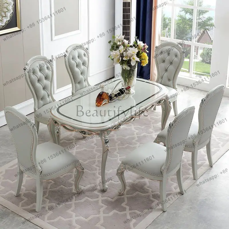 European solid wood dining table and chair combination French home luxury carved oval dining table
European solid wood dining table and chair combination French home luxury carved oval dining table
