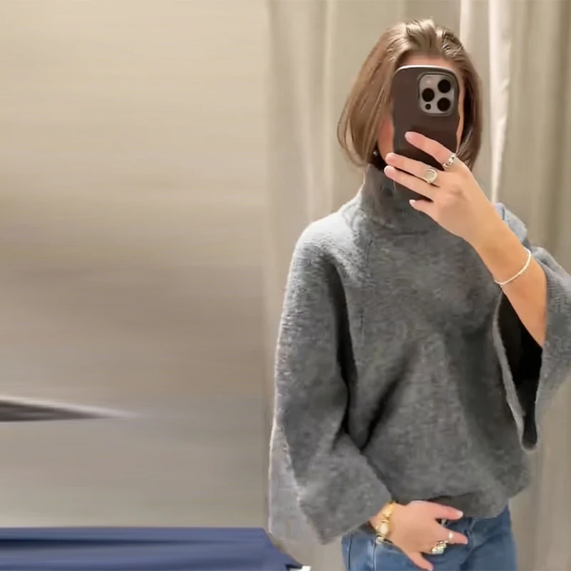 Женский вязаный однотонный серый пуловер с накидкой, свободный свитер с длинными рукавами и высоким воротом, осенне-зимняя верхняя одежда 2026, новая женская уличная одежда
Женский вязаный однотонный серый пуловер с накидкой, свободный свитер с длинными рукавами и высоким воротом, осенне-зимняя верхняя одежда 2026, новая женская уличная одежда
