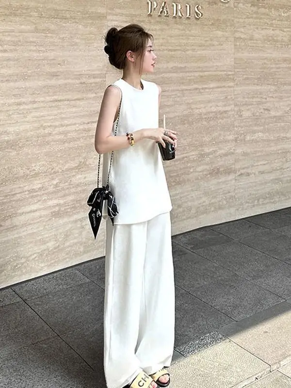 Fashionable Versatile Loose Fit Summer Outfit Slimming Sleeveless Top Wide Leg Pants Set for Young Women 18-25 Years Old
Fashionable Versatile Loose Fit Summer Outfit Slimming Sleeveless Top Wide Leg Pants Set for Young Women 18-25 Years Old
