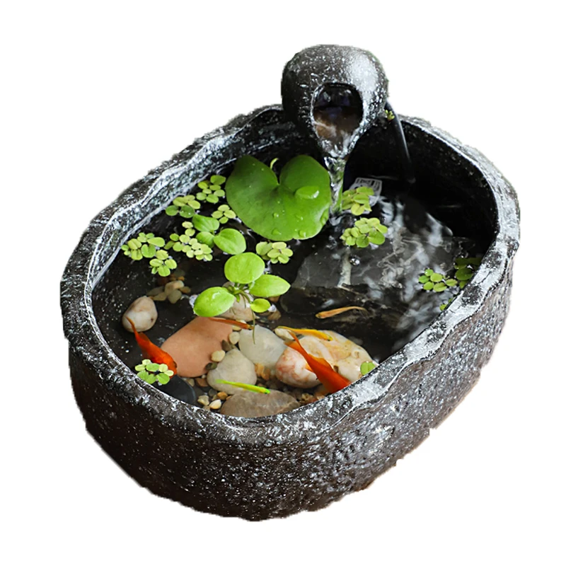 lotus ceramic basin small fish tank flowing water ornament circulating water living room office coffee table decoration 
lotus ceramic basin small fish tank flowing water ornament circulating water living room office coffee table decoration