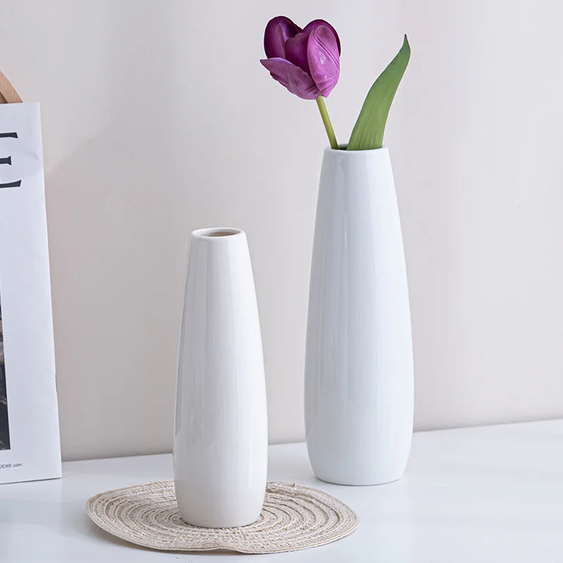White Nordic minimalist ceramic decorative vase - tulip-shaped, suitable for the living room TV cabinet tabletop, entrance hall
White Nordic minimalist ceramic decorative vase - tulip-shaped, suitable for the living room TV cabinet tabletop, entrance hall