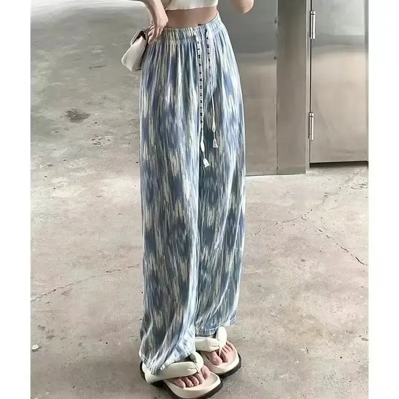 Летние широкие брюки из ледяного шелка, женские брюки с высокой талией, тонкий стиль, свободные утягивающие повседневные брюки длиной до пола 
Летние широкие брюки из ледяного шелка, женские брюки с высокой талией, тонкий стиль, свободные утягивающие повседневные брюки длиной до пола