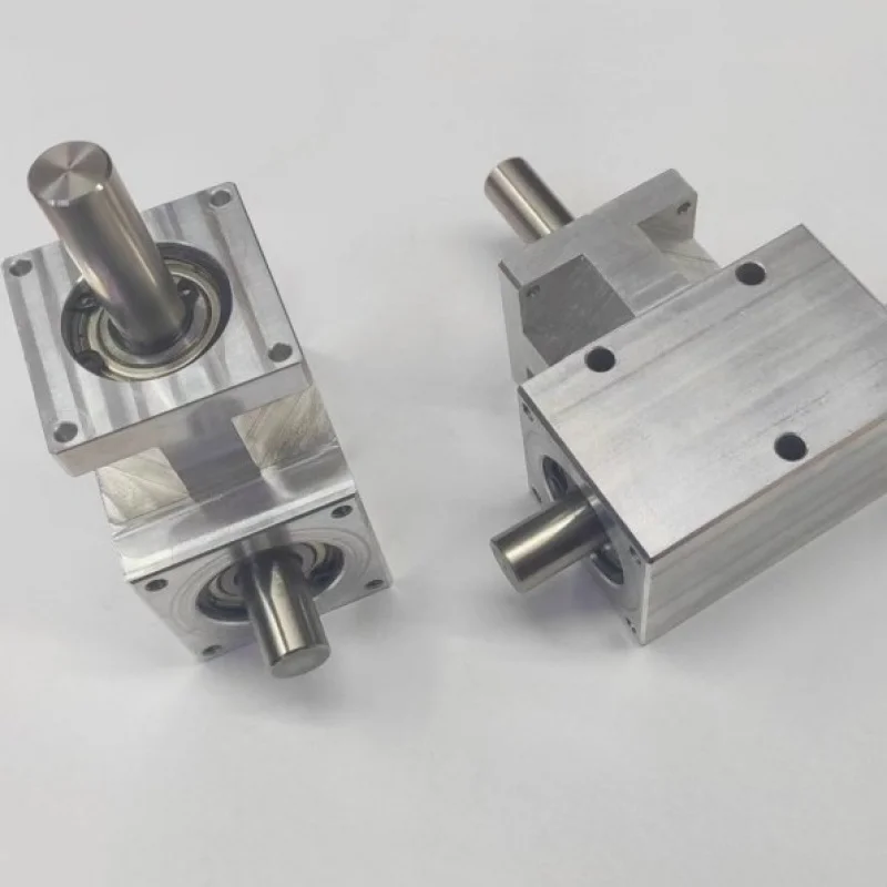 Small Angle Adjuster90Degree1:1Spiral Bevel Gear Shaft12mmCo-Directional Dual Output Shaft Differential Assembly Gear Box
Small Angle Adjuster90Degree1:1Spiral Bevel Gear Shaft12mmCo-Directional Dual Output Shaft Differential Assembly Gear Box