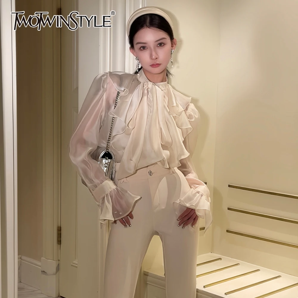 TWOTWINSTYLE Solid Spliced Button Loose Blouse For Women Lapel Long Sleeve Casual Minimalist Shirts Female Fashion Style Clothes
TWOTWINSTYLE Solid Spliced Button Loose Blouse For Women Lapel Long Sleeve Casual Minimalist Shirts Female Fashion Style Clothes