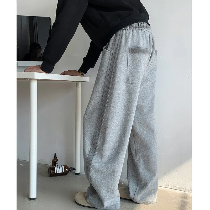 2026 Spring and Autumn Scimitar Sweatpants Men's New Cleanfit Casual Sports Pants Loose Straight Wide-leg Trousers
2026 Spring and Autumn Scimitar Sweatpants Men's New Cleanfit Casual Sports Pants Loose Straight Wide-leg Trousers