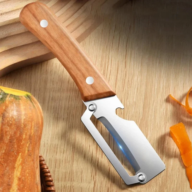 Stainless steel peeler with wooden handle for peeling and slicing fruits and vegetables | Durable and smooth operation
Stainless steel peeler with wooden handle for peeling and slicing fruits and vegetables | Durable and smooth operation