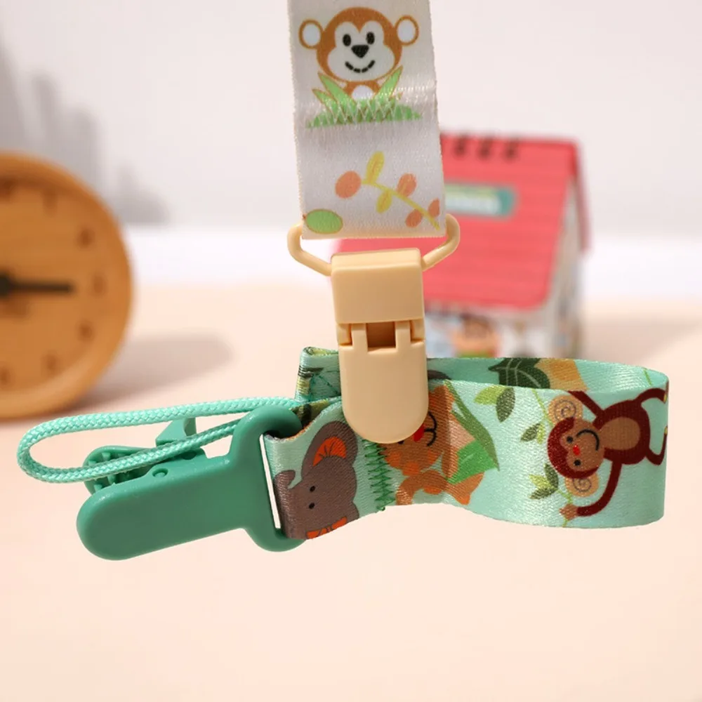 Cute Cartoon Baby Pacifier Clips Anti-drop Buckle Strap Adjustable Pacifier Chain Fixed Button Ribbon Nipple Holder
Cute Cartoon Baby Pacifier Clips Anti-drop Buckle Strap Adjustable Pacifier Chain Fixed Button Ribbon Nipple Holder