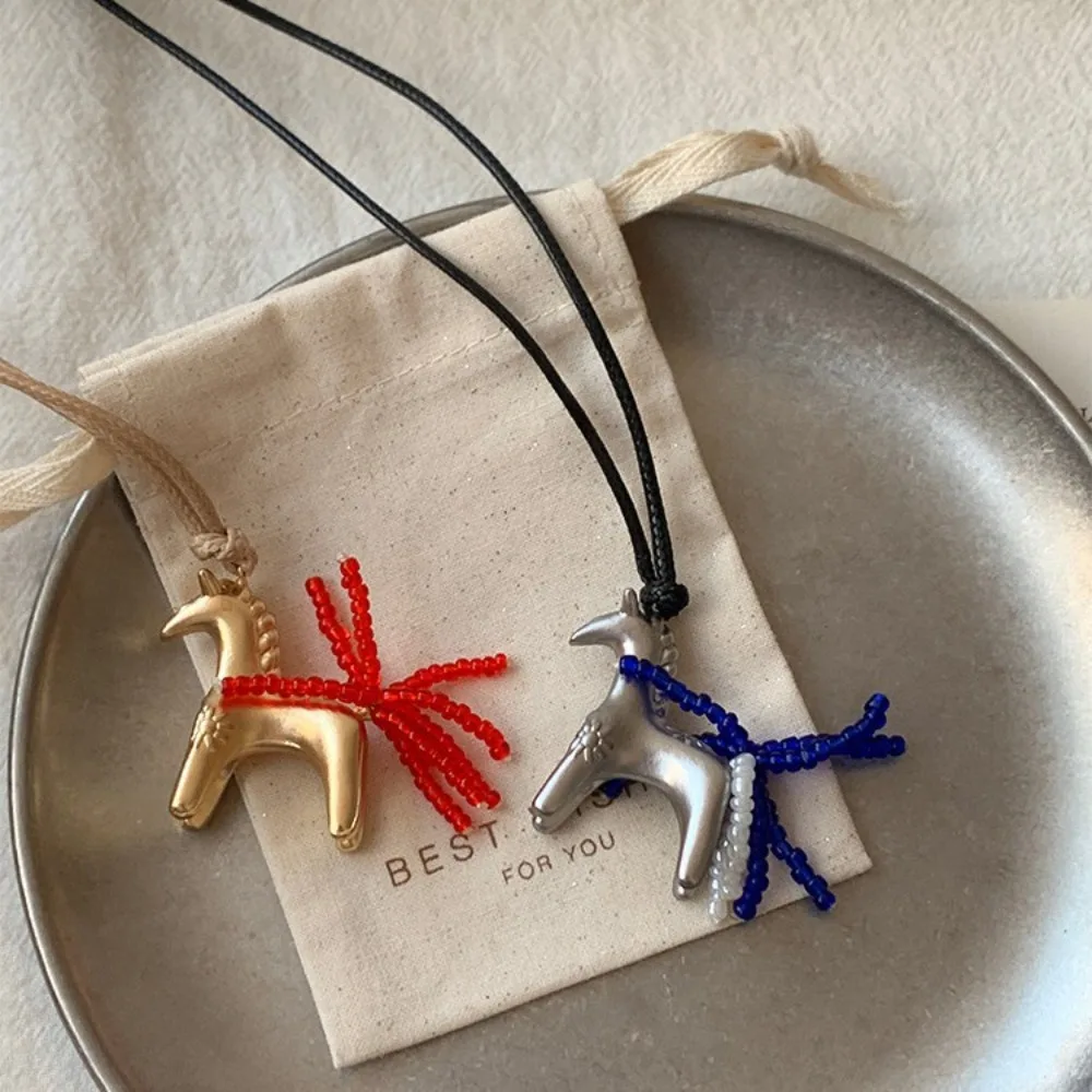 Vintage Metallic Creative Cartoon Horse Bead Strand Tassel Pendant Necklace for Women Long Adjustable Wax Rope Jewelry Accessroy
Vintage Metallic Creative Cartoon Horse Bead Strand Tassel Pendant Necklace for Women Long Adjustable Wax Rope Jewelry Accessroy
