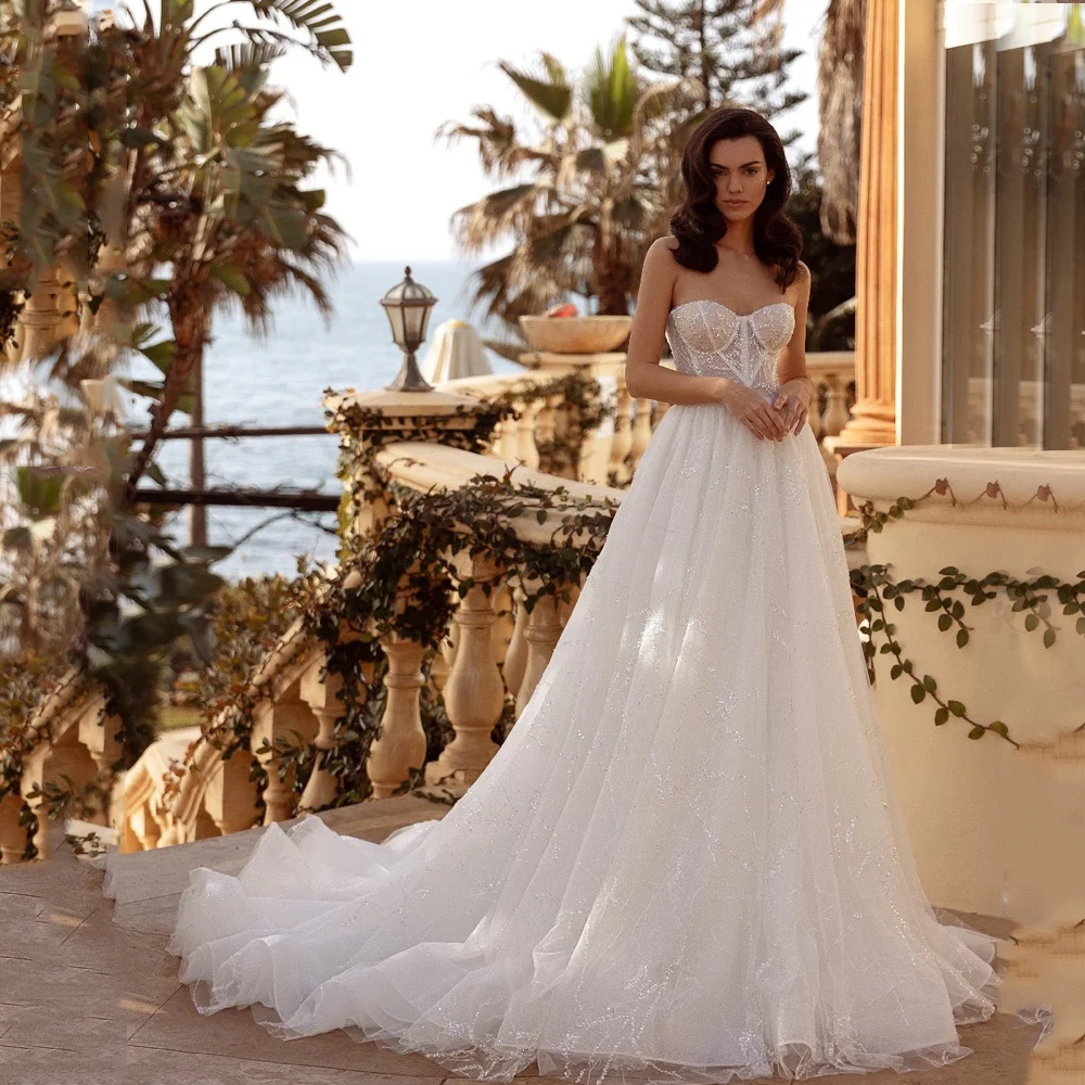 Shinny Wedding Dress 2025 Luxury Customized Strapless Sleeveless Sequined Glitter Tulle Zipper Back A Line Bridal Gown for Bride
Shinny Wedding Dress 2025 Luxury Customized Strapless Sleeveless Sequined Glitter Tulle Zipper Back A Line Bridal Gown for Bride