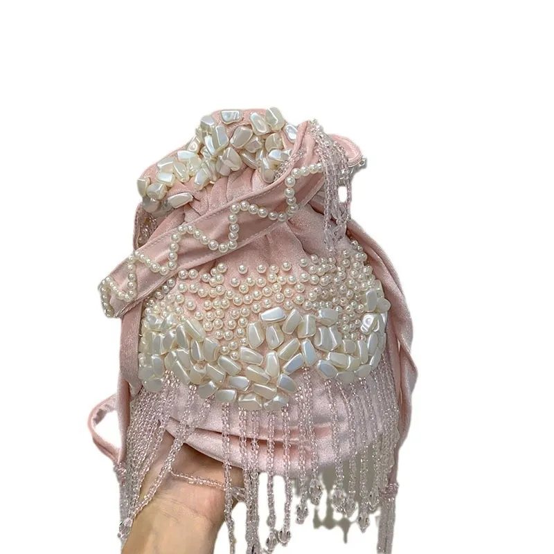 Handmade Pearl Bag Drawstring Bags With Tassel Hand-Woven Celebrity Handbags Ladies Party Bag Beading Top-handle Fringe Purses
Handmade Pearl Bag Drawstring Bags With Tassel Hand-Woven Celebrity Handbags Ladies Party Bag Beading Top-handle Fringe Purses