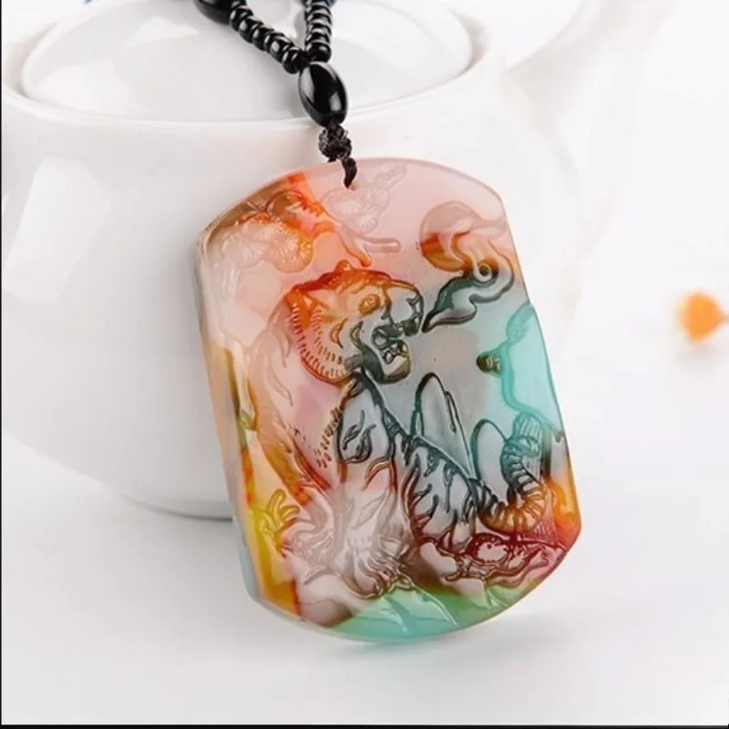 Xinjiang natural colorful outer Mongolian material up the mountain tiger jade pendant for men and women
Xinjiang natural colorful outer Mongolian material up the mountain tiger jade pendant for men and women