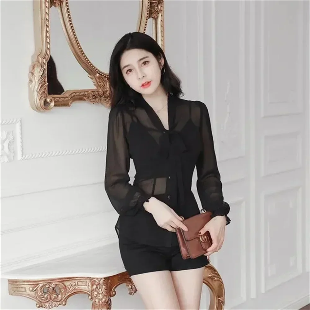 Сексуальная черная тонкая женская шифоновая рубашка с длинными рукавами, блузка, новый солнцезащитный крутой топ
Сексуальная черная тонкая женская шифоновая рубашка с длинными рукавами, блузка, новый солнцезащитный крутой топ