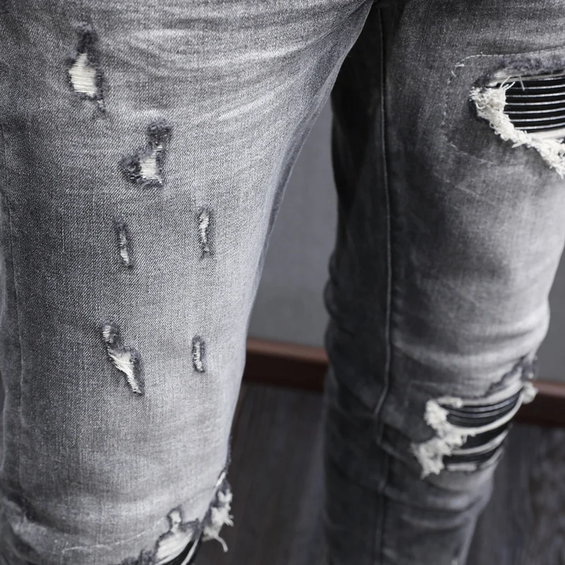 Fashionable new men's jeans perforated black leather patch washed nostalgic black jeans designer high street hip-hop brand pants
Fashionable new men's jeans perforated black leather patch washed nostalgic black jeans designer high street hip-hop brand pants