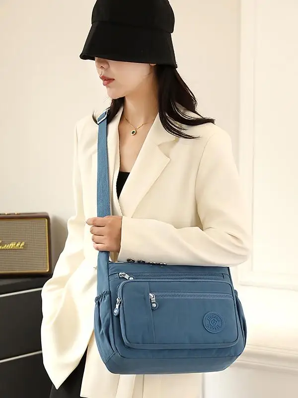 Сумка на одно плечо из ткани быка, большая повседневная сумка через плечо Capaci для женщин, модная универсальная сумка для мамы, пригородная сумка Sle
Сумка на одно плечо из ткани быка, большая повседневная сумка через плечо Capaci для женщин, модная универсальная сумка для мамы, пригородная сумка Sle