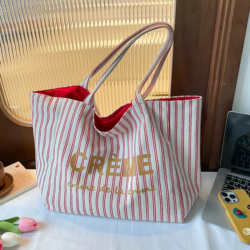 Женская полосатая холщовая сумка-тоут в корейском стиле, двусторонняя, вместительная, прочная, на плечо, повседневная и простая сумка для покупок
Женская полосатая холщовая сумка-тоут в корейском стиле, двусторонняя, вместительная, прочная, на плечо, повседневная и простая сумка для покупок