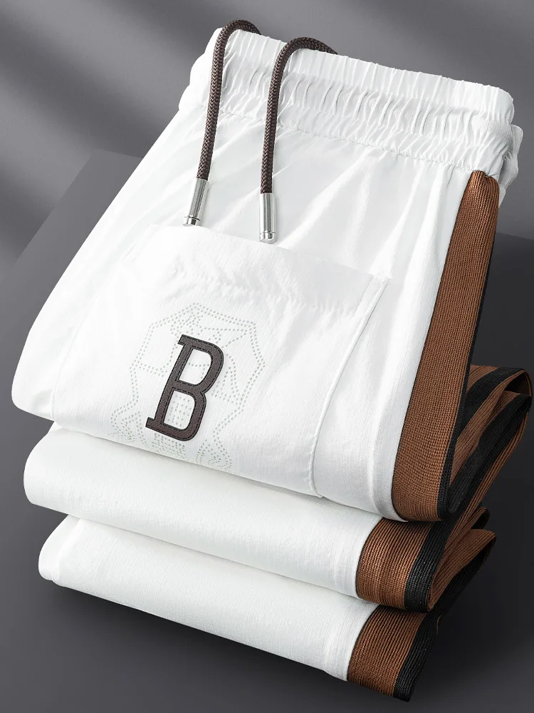 Летние мужские спортивные брюки из ледяного шелка: дышащие, тонкие, прямого кроя, повседневные, для отдыха, с боковыми вставками, легкие и комфортные
Летние мужские спортивные брюки из ледяного шелка: дышащие, тонкие, прямого кроя, повседневные, для отдыха, с боковыми вставками, легкие и комфортные