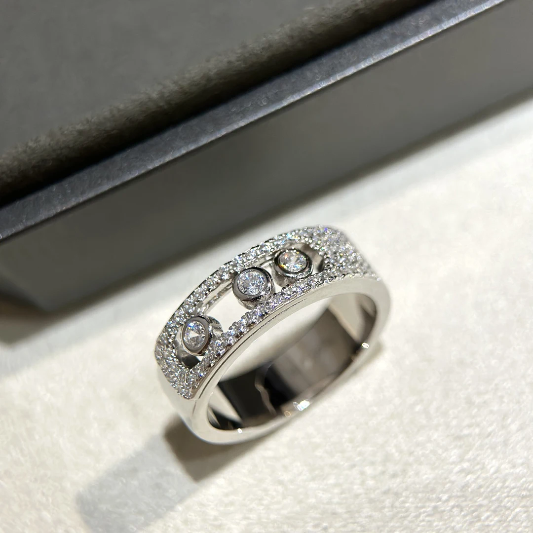 The new 925 sterling silver material three diamond sliding full zircon ring is fashionable, unique,versatile,and simple to match
The new 925 sterling silver material three diamond sliding full zircon ring is fashionable, unique,versatile,and simple to match